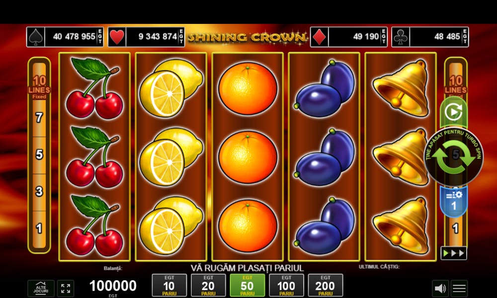 Joc cu fructe Shining Crown precum cirește, lămâi, portocale, prune, pepeni. În imagine este prezentat ecranul de joc cu simbolurile cu fructe specifice și bara de mize.